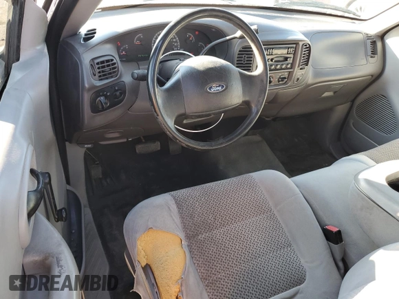 2004 Ford F-150 XL z VIN 2FTRF07274CA23500, wystawiony jako Copart lot #88761275 z przebiegiem 257 573 mil mil oraz Szkoda całkowita • Salvage title. Historia ofert i sprzedaży dostępna na DreamBid. Obrazek 8.