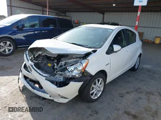2012 Toyota Prius c One with VIN JTDKDTB38C1514005, listed as a IAAI auction lot 41903868 with 62,344 mi miles. Bid and sale history available at carsss.com. Image 6.