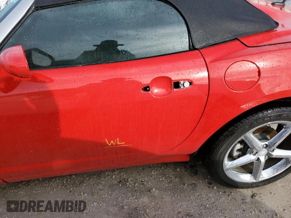 2009 Saturn Sky z VIN 1G8MN35B79Y103875, wystawiony jako Copart lot #74669844 z przebiegiem Nie podano mil oraz Szkody całkowita. Historia ofert i sprzedaży dostępna na DreamBid. Obrazek 12.