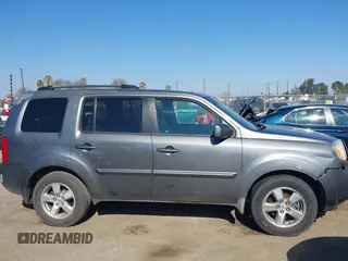 2009 Honda Pilot EX with VIN 5FNYF48439B036957, listed as a IAAI auction lot 41656284 with 199,115 mi miles. Bid and sale history available at carsss.com. Image 13.
