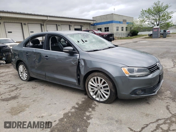 2014 Volkswagen Jetta TDI w/Premium with VIN 3VWLL7AJ1EM428536, listed as a Copart auction lot 53896765 with 75,525 mi miles and Salvage title. Bid and sale history available at DreamBid. Image 4.