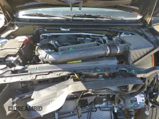 2024 Nissan Frontier S z VIN 1N6ED1CL1RN643198, wystawiony jako Copart lot #55615745 z przebiegiem 2 698 mil mil oraz Czysty tytuł • Clean title. Historia ofert i sprzedaży dostępna na DreamBid. Obrazek 11.