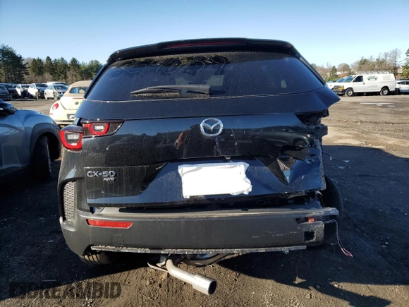 2024 Mazda CX-50 S Premium with VIN 7MMVABDM9RN233239, listed as a Copart auction lot 50028865 with 10,584 mi miles and Salvage Title. Bid and sale history available at DreamBid. Image 6.
