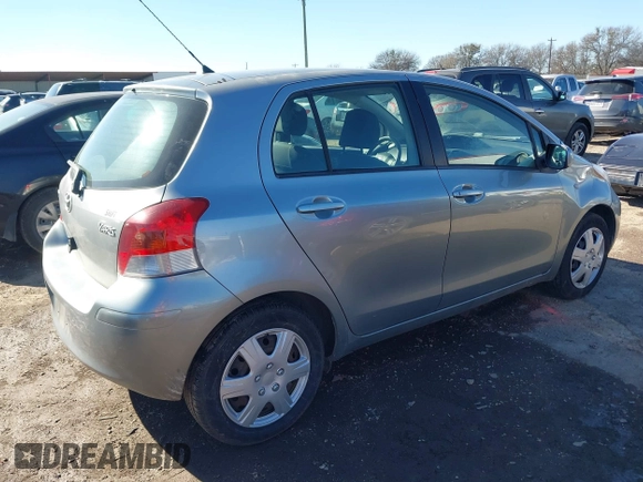 2010 Toyota Yaris with VIN JTDKT4K38A5285260, listed as a IAAI auction lot 41476373 with 104,358 mi miles. Bid and sale history available at carsss.com. Image 4.