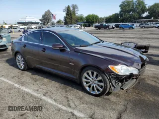 2011 Jaguar XF Premium with VIN SAJWA0GB1BLS08325, listed as a Copart auction lot 61190335 with 61,656 mi miles and Salvage title. Bid and sale history available at DreamBid. Image 4.