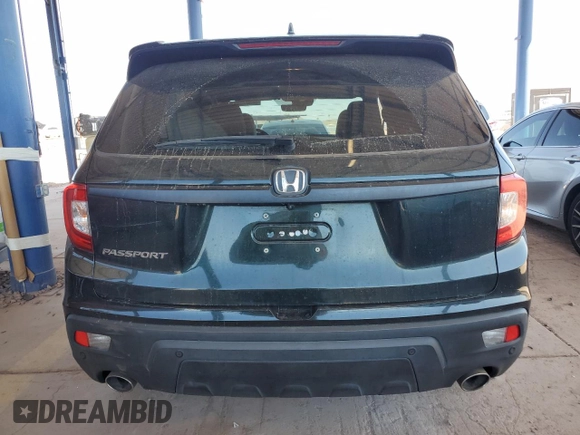 2019 Honda Passport EX-L с VIN 5FNYF7H53KB011007, выставлен на аукционе Copart как лот 58022835 с пробегом 49 018 миль миль и Списание • Salvage title. История ставок и продаж доступна на DreamBid. Изображение 6.