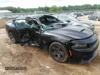 2020 Dodge Charger R/T z VIN 2C3CDXCT7LH166763, wystawiony jako IAAI lot #42334359 z przebiegiem 104 472 mil mil oraz . Historia ofert i sprzedaży dostępna na DreamBid. Obrazek 1.