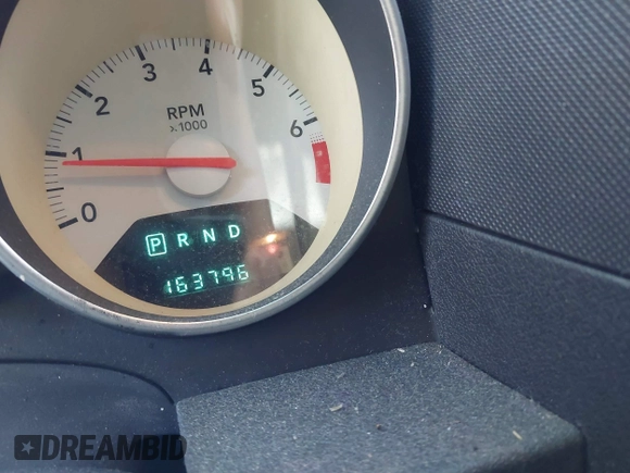 2009 Dodge Caliber SXT with VIN 1B3HB48A69D130857, listed as a IAAI auction lot 41526199 with 163,796 mi miles and . Bid and sale history available at DreamBid. Image 15.