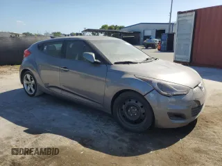 2012 Hyundai Veloster w/Black Int z VIN KMHTC6AD4CU046609, wystawiony jako Copart lot #54888045 z przebiegiem 152 997 mil mil oraz Szkoda całkowita • Salvage title. Historia ofert i sprzedaży dostępna na DreamBid. Obrazek 4.
