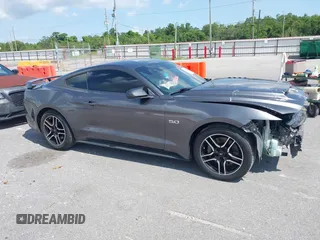 2015 Ford Mustang GT z VIN 1FA6P8CFXF5368661, wystawiony jako IAAI lot #42442905 z przebiegiem 117 064 mil mil oraz . Historia ofert i sprzedaży dostępna na DreamBid. Obrazek 13.