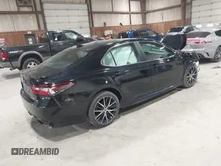2021 Toyota Camry SE Nightshade with VIN 4T1T11AK2MU483971, listed as a IAAI auction lot 41934957 with 61,618 mi miles and . Bid and sale history available at DreamBid. Image 4.
