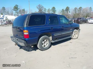 2002 Chevrolet Tahoe LT with VIN 1GNEK13Z62J160310, listed as a IAAI auction lot 41710379 with 154,873 mi miles. Bid and sale history available at carsss.com. Image 4.