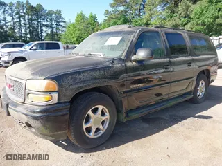 2003 GMC Yukon XL Denali with VIN 1GKFK66U43J248482, listed as a IAAI auction lot 42073907 with 286,896 mi miles. Bid and sale history available at carsss.com. Image 2.