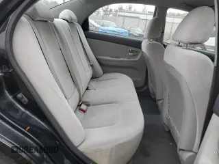2009 Kia Spectra EX with VIN KNAFE222495648220, listed as a Copart auction lot 52886915 with 146,417 mi miles and Salvage title. Bid and sale history available at DreamBid. Image 10.