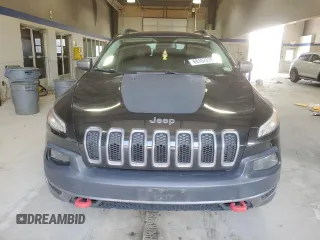 2014 Jeep Cherokee Trailhawk with VIN 1C4PJMBB8EW171116, listed as a Copart auction lot 60107215 with 168,979 mi miles and Salvage title. Bid and sale history available at DreamBid. Image 5.