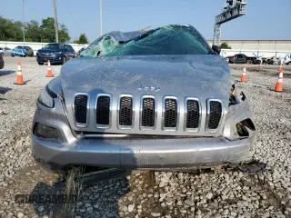 2017 Jeep Cherokee Sport with VIN 1C4PJMAB1HW563201, listed as a Copart auction lot 59742435 with 149,423 mi miles and Salvage title. Bid and sale history available at DreamBid. Image 5.