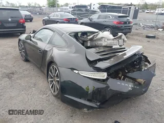 2014 Porsche 911 Carrera with VIN WP0AA2A92ES106536, listed as a IAAI auction lot 42048411 with 108,216 mi miles and . Bid and sale history available at DreamBid. Image 3.