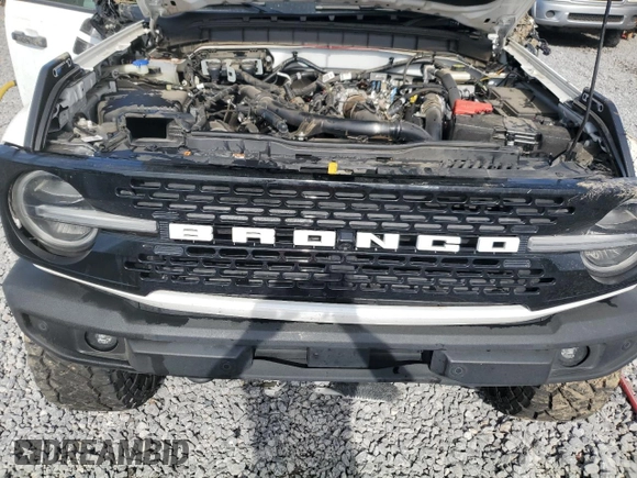 2022 Ford Bronco с VIN 1FMEE5DP6NLB41068, выставлен на аукционе Copart как лот 50778505 с пробегом 70 431 миль миль и Списание • Salvage title. История ставок и продаж доступна на DreamBid. Изображение 11.