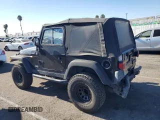 2005 Jeep Wrangler Rubicon with VIN 1J4FA69SX5P343826, listed as a Copart auction lot 69074374 with 179,610 mi miles and Salvage Title. Bid and sale history available at carsss.com. Image 2.