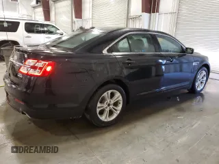 2014 Ford Taurus SEL z VIN 1FAHP2E82EG186640, wystawiony jako Copart lot #55820205 z przebiegiem 194 843 mil mil oraz Czysty tytuł • Clean title. Historia ofert i sprzedaży dostępna na DreamBid. Obrazek 3.