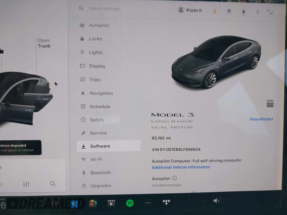 2020 Tesla Model 3 Long Range with VIN 5YJ3E1EB6LF666624, listed as a IAAI auction lot 41720664 with 65,973 mi miles. Bid and sale history available at carsss.com. Image 7.