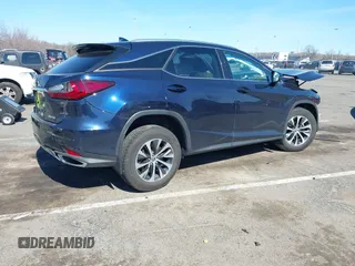 2022 Lexus RX with VIN 2T2HZMDA4NC358746, listed as a IAAI auction lot 41772090 with 26,370 mi miles. Bid and sale history available at carsss.com. Image 4.