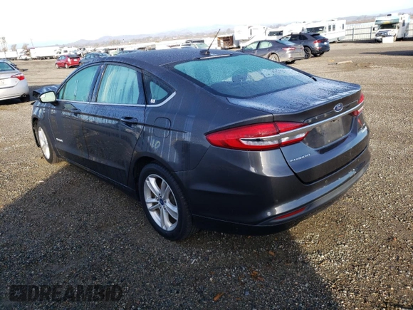 2018 Ford Fusion Hybrid SE with VIN 3FA6P0LUXJR165243, listed as a Copart auction lot 72653682 with 52,880 mi miles. Bid and sale history available at carsss.com. Image 2.
