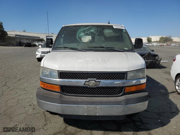 2012 Chevrolet Express Passenger 1LT with VIN 1GAZG1FG4C1100252, listed as a Copart auction lot 73242444 with 76,779 mi miles and Salvage Title. Bid and sale history available at carsss.com. Image 5.