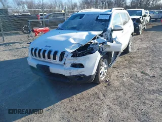 2018 Jeep Cherokee Latitude with VIN 1C4PJMCX8JD548480, listed as a IAAI auction lot 41378186 with 52,051 mi miles and . Bid and sale history available at DreamBid. Image 2.