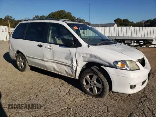 2002 Mazda MPV LX with VIN JM3LW28J720312394, listed as a Copart auction lot 76765674 with 134,286 mi miles and Salvage Title. Bid and sale history available at carsss.com. Image 4.