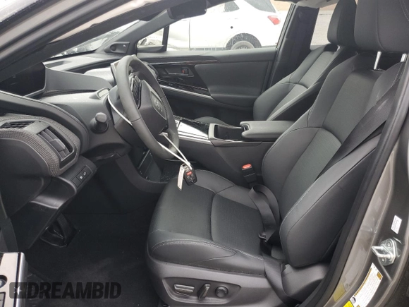 2024 Toyota bZ4X XLE with VIN JTMAAAAA8RA045760, listed as a Copart auction lot 50996385 with 3,833 mi miles and Salvage Title. Bid and sale history available at DreamBid. Image 7.