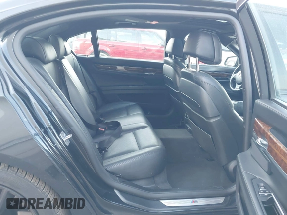 2015 BMW 7 Series 750Li xDrive with VIN WBAYF8C55FD654949, listed as a IAAI auction lot 41659763 with 91,837 mi miles and . Bid and sale history available at carsss.com. Image 8.