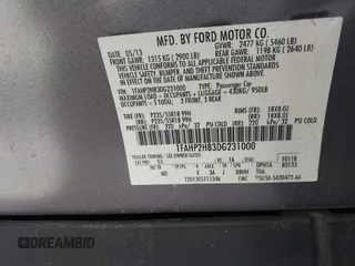 2013 Ford Taurus SEL z VIN 1FAHP2H83DG231000, wystawiony jako IAAI lot #41986420 z przebiegiem 200 390 mil mil oraz . Historia ofert i sprzedaży dostępna na DreamBid. Obrazek 9.