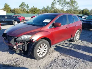 2010 Mazda CX-7 SV with VIN JM3ER2W56A0306252, listed as a IAAI auction lot 41327009 with 148,544 mi miles. Bid and sale history available at carsss.com. Image 2.