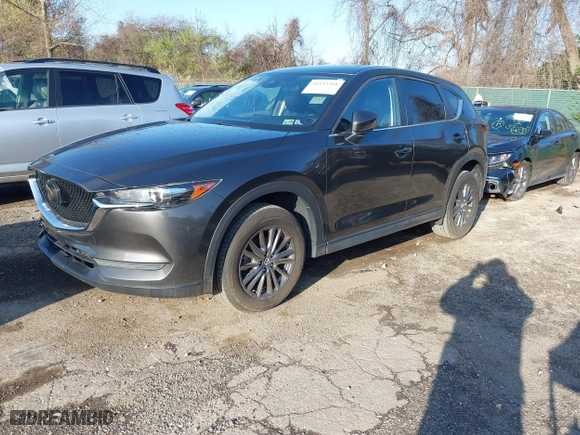 2020 Mazda CX-5 Touring with VIN JM3KFACM2L0786598, listed as a IAAI auction lot 41933368 with 93,657 mi miles. Bid and sale history available at carsss.com. Image 18.