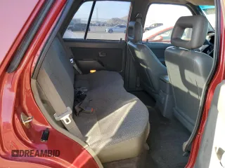1997 Isuzu Rodeo z VIN 4S2CK58VXV4315798, wystawiony jako Copart lot #68860764 z przebiegiem 241 215 mil mil oraz Szkoda całkowita • Salvage title. Historia ofert i sprzedaży dostępna na DreamBid. Obrazek 11.