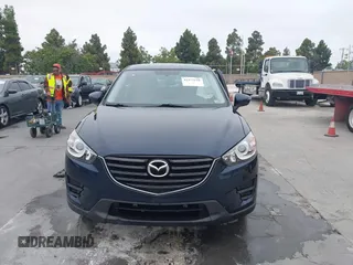 2016 Mazda CX-5 Sport с VIN JM3KE2BY2G0856071, выставлен на аукционе IAAI как лот 42473128 с пробегом 57 250 миль миль и . История ставок и продаж доступна на DreamBid. Изображение 12.