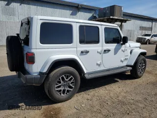 2024 Jeep Wrangler Sahara with VIN 1C4PJXEN7RW297948, listed as a Copart auction lot 54656795 with 12,292 mi miles and Salvage title. Bid and sale history available at DreamBid. Image 3.