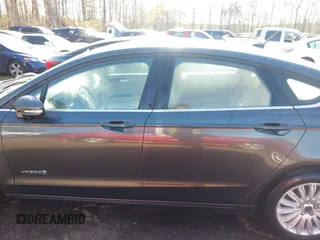 2015 Ford Fusion SE Hybrid with VIN 3FA6P0LU2FR135144, listed as a IAAI auction lot 41975973 with 89,315 mi miles. Bid and sale history available at carsss.com. Image 14.
