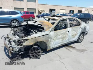 2003 Toyota Camry LE z VIN 4T1BF30K33U551509, wystawiony jako IAAI lot #42159776 z przebiegiem Nie podano mil oraz . Historia ofert i sprzedaży dostępna na DreamBid. Obrazek 2.