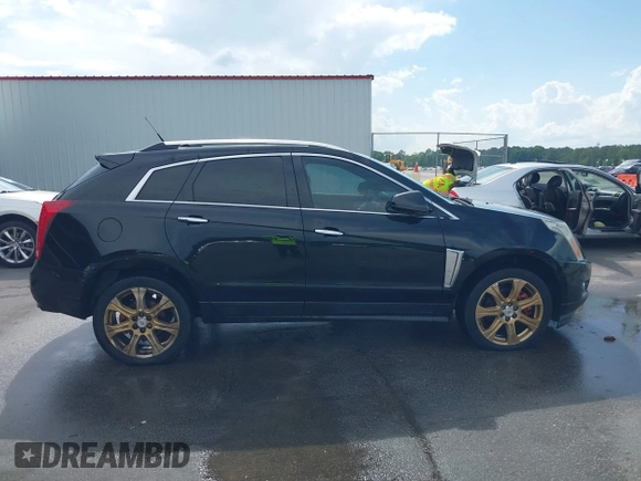 2014 Cadillac SRX Performance Collection with VIN 3GYFNCE31ES683465, listed as a IAAI auction lot 42107705 with 117,285 mi miles. Bid and sale history available at carsss.com. Image 13.