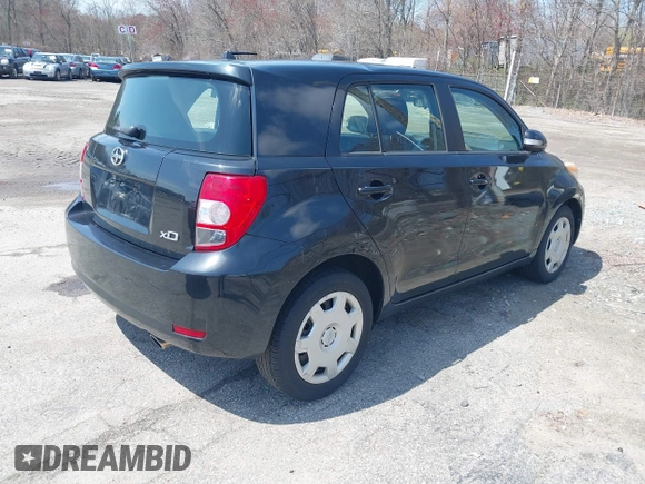 2010 Scion xD with VIN JTKKU4B48A1006962, listed as a IAAI auction lot 42097112 with 135,178 mi miles. Bid and sale history available at carsss.com. Image 4.
