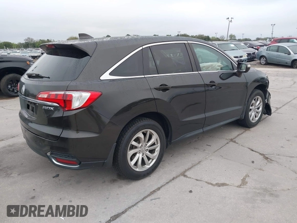 2017 Acura RDX with VIN 5J8TB3H35HL018433, listed as a IAAI auction lot 41628778 with 216,627 mi miles. Bid and sale history available at carsss.com. Image 4.