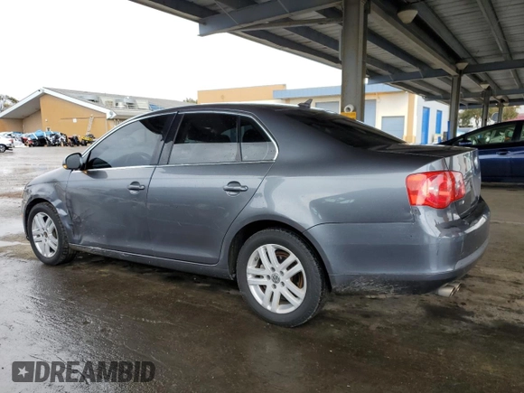 2007 Volkswagen Jetta z VIN 3VWDG71K47M101262, wystawiony jako Copart lot #51469695 z przebiegiem 241 174 mil mil oraz Szkoda całkowita • Salvage title. Historia ofert i sprzedaży dostępna na DreamBid. Obrazek 2.