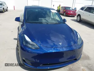 2023 Tesla Model Y Long Range with VIN 7SAYGDEE9PA205757, listed as a IAAI auction lot 41705881 with 18,567 mi miles and . Bid and sale history available at carsss.com. Image 12.