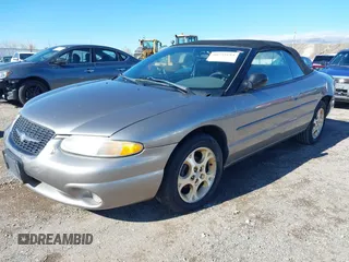 1999 Chrysler Sebring JXi with VIN 3C3EL55H8XT571486, listed as a IAAI auction lot 40755184 with 163,286 mi miles and . Bid and sale history available at DreamBid. Image 2.