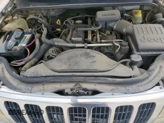 2003 Jeep Grand Cherokee Laredo with VIN 1J4GX48S13C609036, listed as a Copart auction lot 63143505 with 127,188 mi miles and Clean title. Bid and sale history available at DreamBid. Image 12.