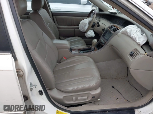 2004 Toyota Avalon XL with VIN 4T1BF28B84U384211, listed as a IAAI auction lot 41925260 with 122,669 mi miles and . Bid and sale history available at DreamBid. Image 5.