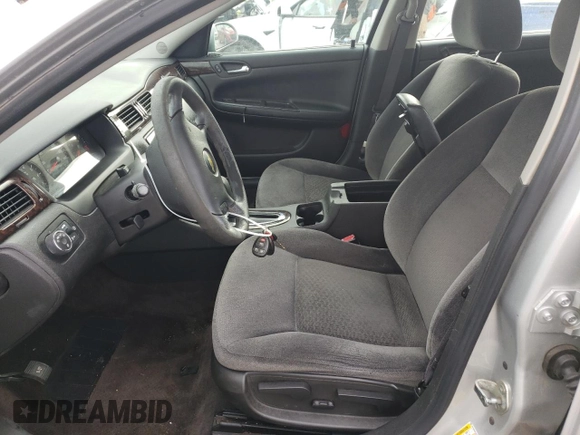 2015 Chevrolet Impala LS with VIN 2G1WA5E32F1123103, listed as a Copart auction lot 56298335 with 176,800 mi miles and Salvage title. Bid and sale history available at DreamBid. Image 7.