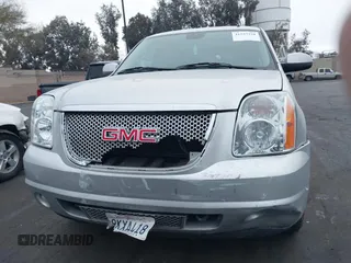 2013 GMC Yukon SLT with VIN 1GKS1CE07DR157076, listed as a IAAI auction lot 41557228 with 148,242 mi miles. Bid and sale history available at carsss.com. Image 13.